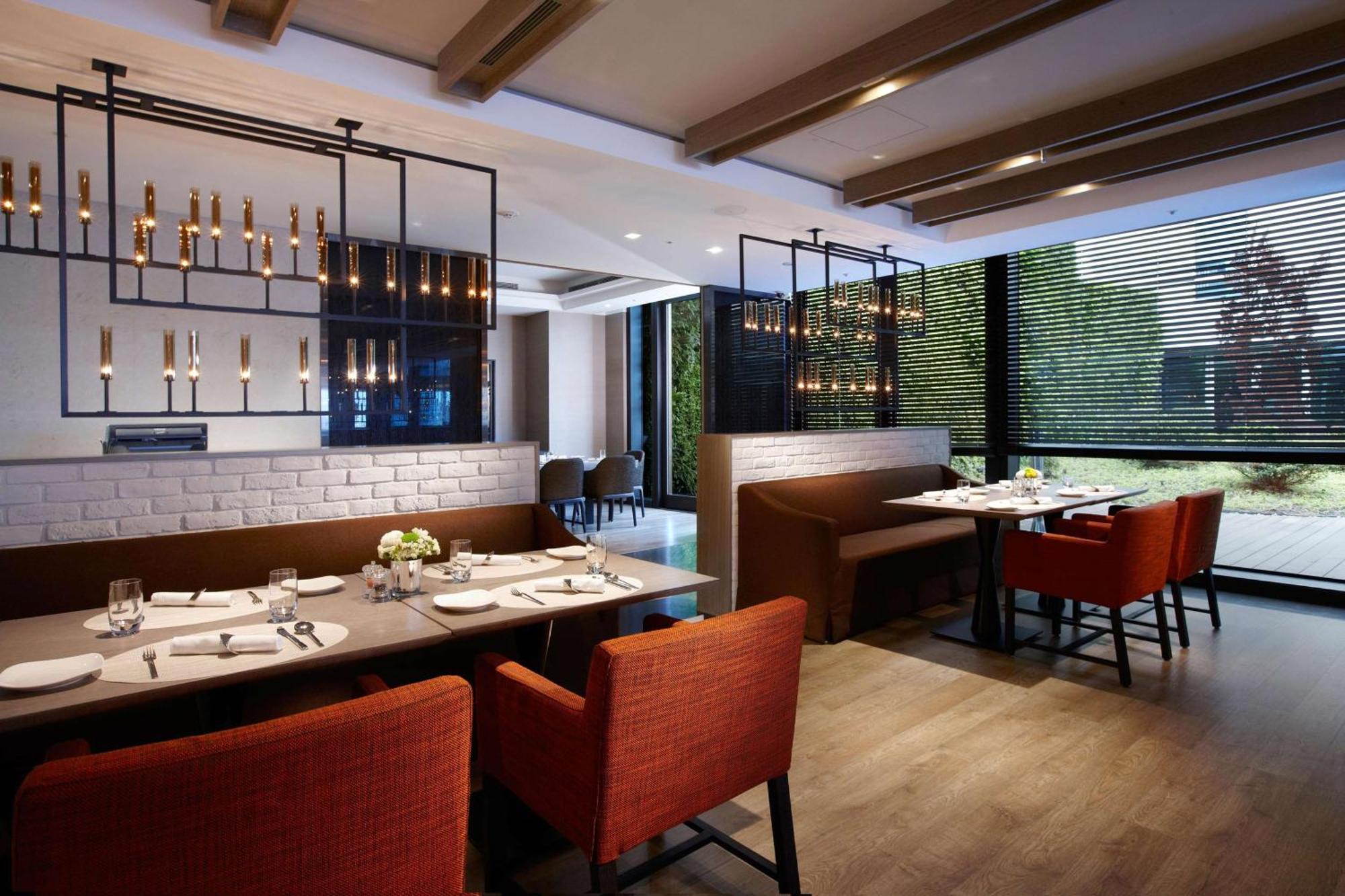 Humble House Taipei, Curio Collection By Hilton Hotel Buitenkant foto The interior of the restaurant